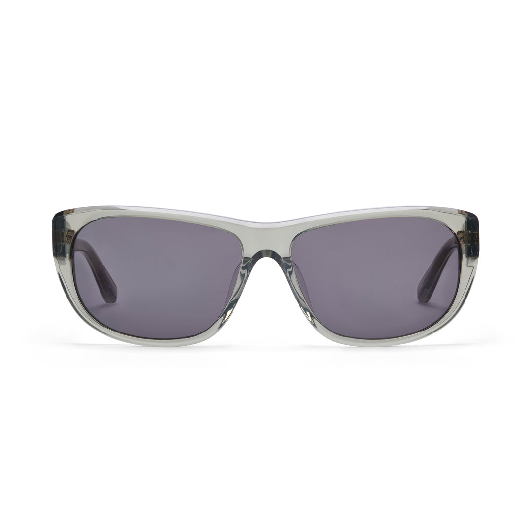 Sunglasses with a clear moss green frame and dark lenses on a white background
