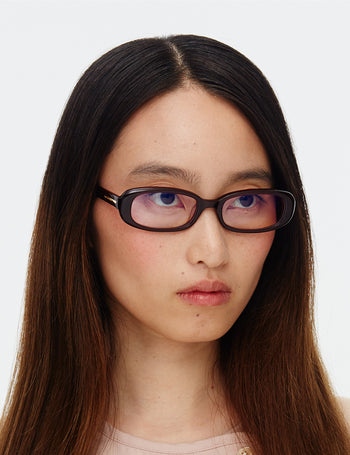 Model is wearing Hot Futures Aurora Cherry Red Prescription Eye Glasses  shot from the side angle