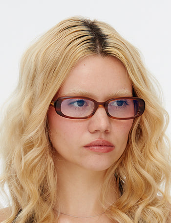 Model Side Shot wearing Hot Futures Aurora Eco Caramel Clear Lens Prescription Glasses