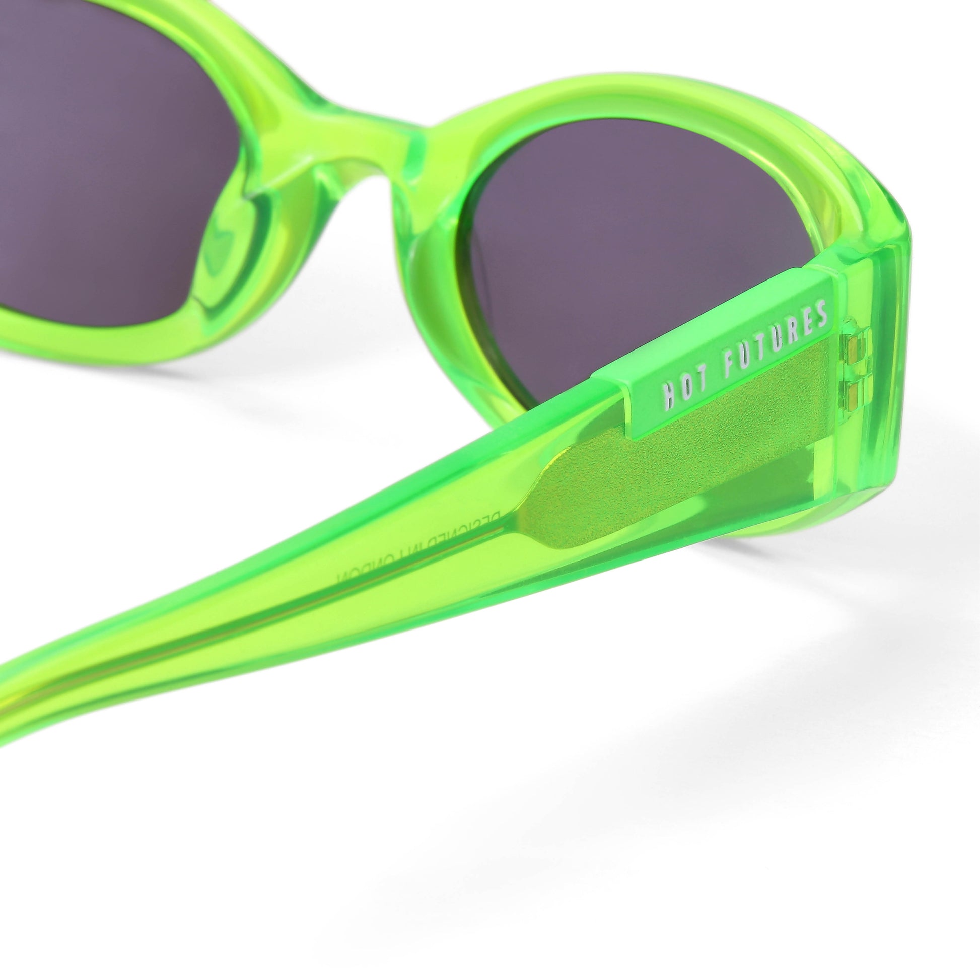 Neon green sunglasses with dark lenses on a white background