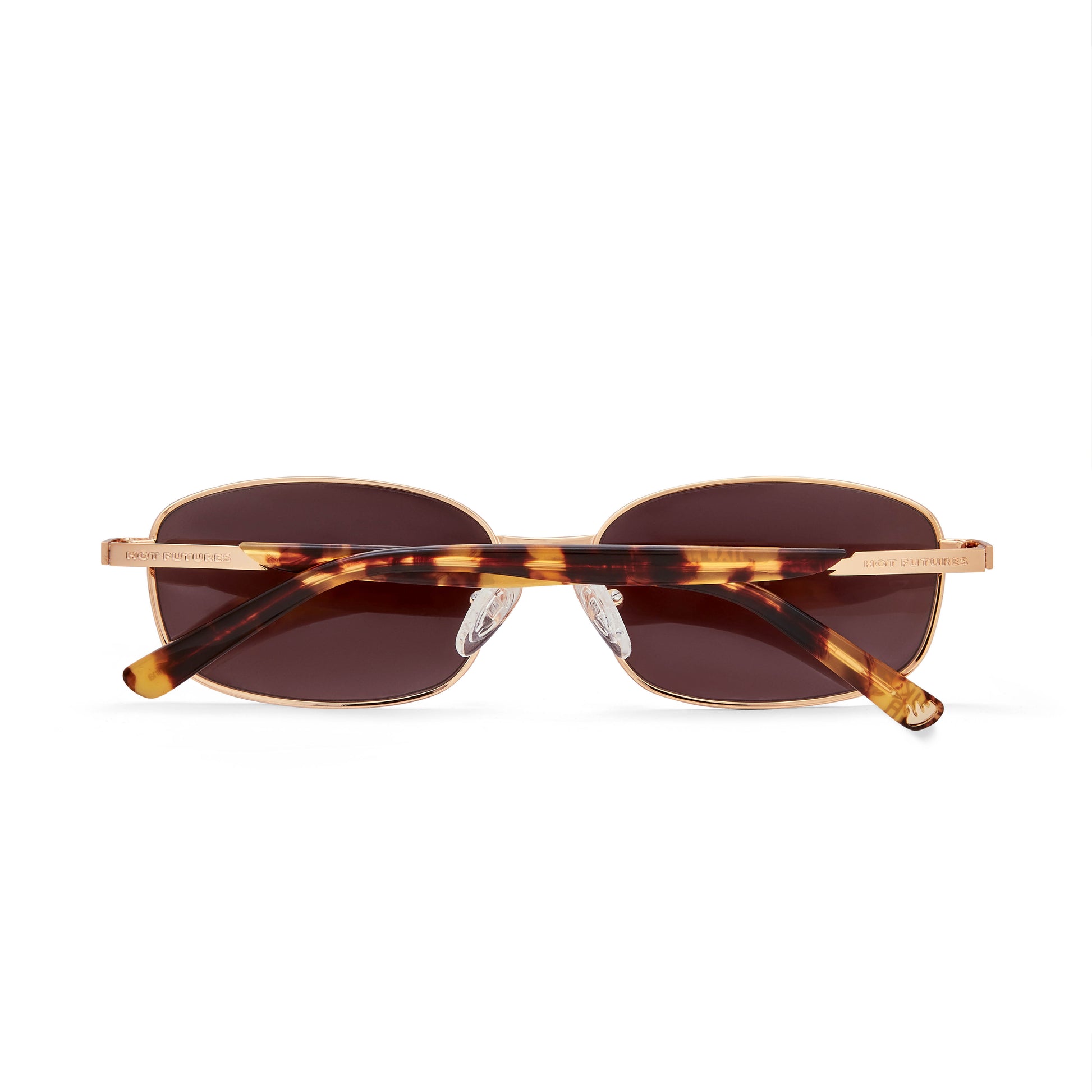 Sunglasses with tortoiseshell frame and brown lenses on a white background