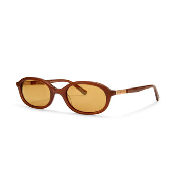 Brown cupid sunglasses by Hot Futures, with a gold lens against a white background