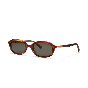 Cupid Caramel Tortoiseshell sunglasses with dark green lenses against a white background