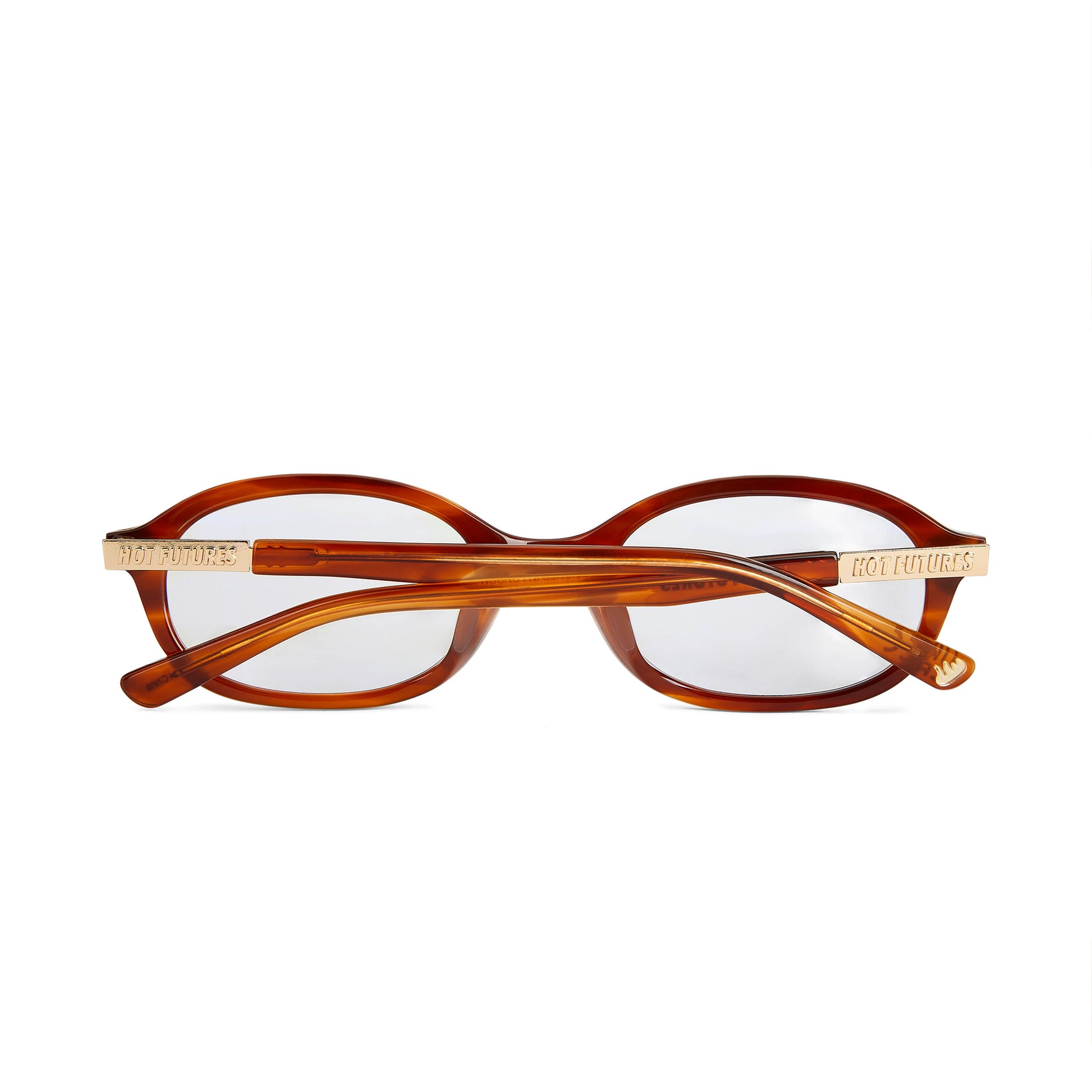 back shot of the cupid caramel eye glasses folded with the gold Hot Futures branding shown on the arms