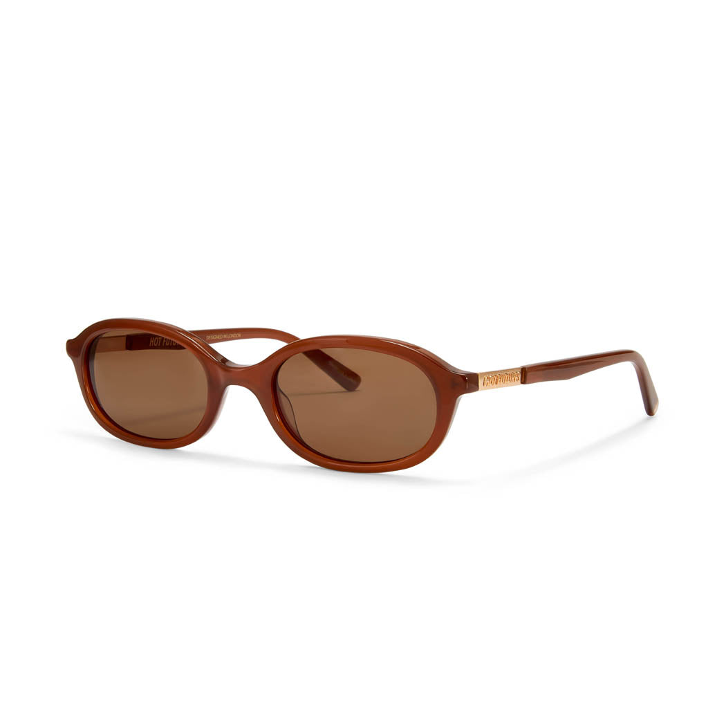 A pair of brown oval sunglasses with gold accents on the arms.