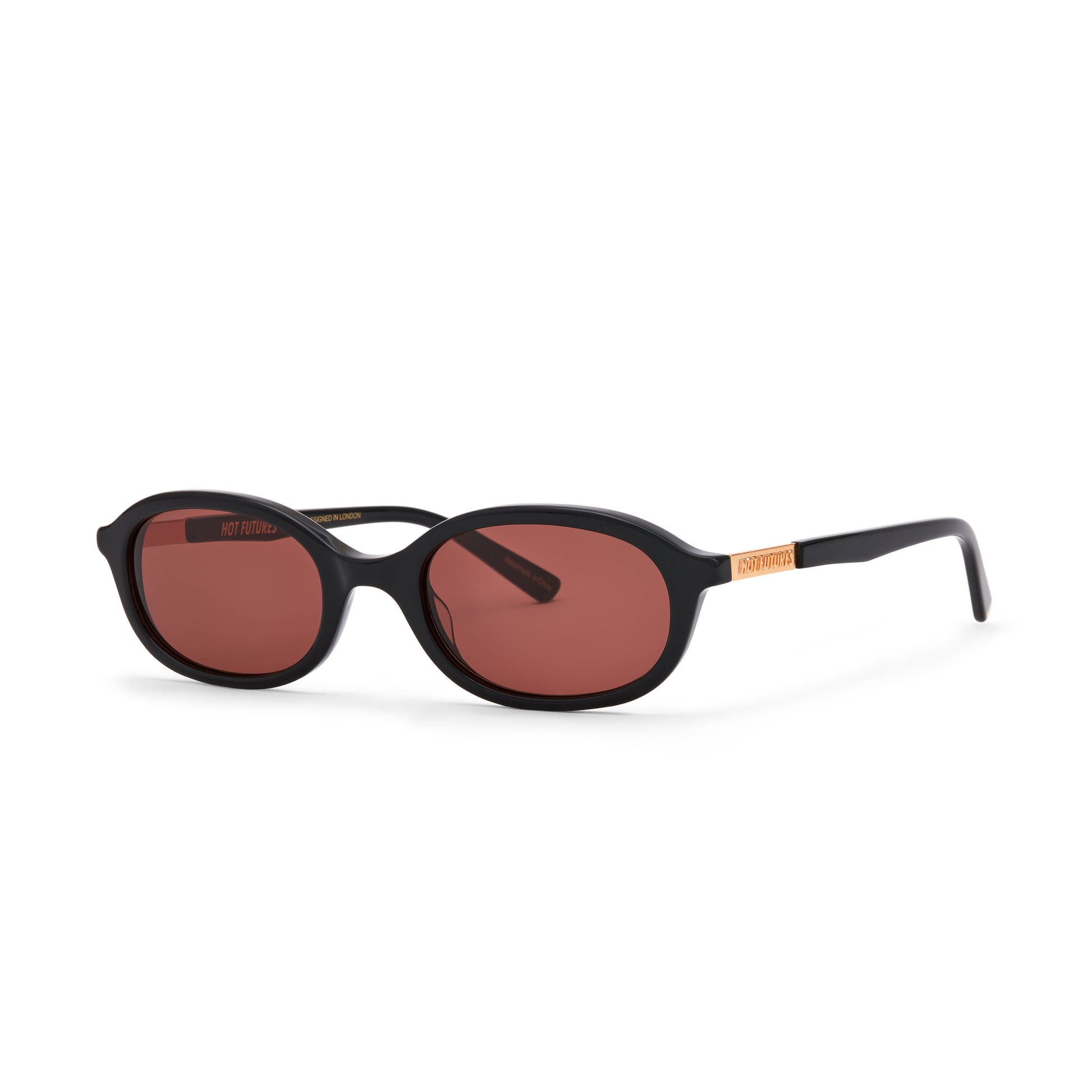 Sunglasses with black frame and brown lenses on a white background