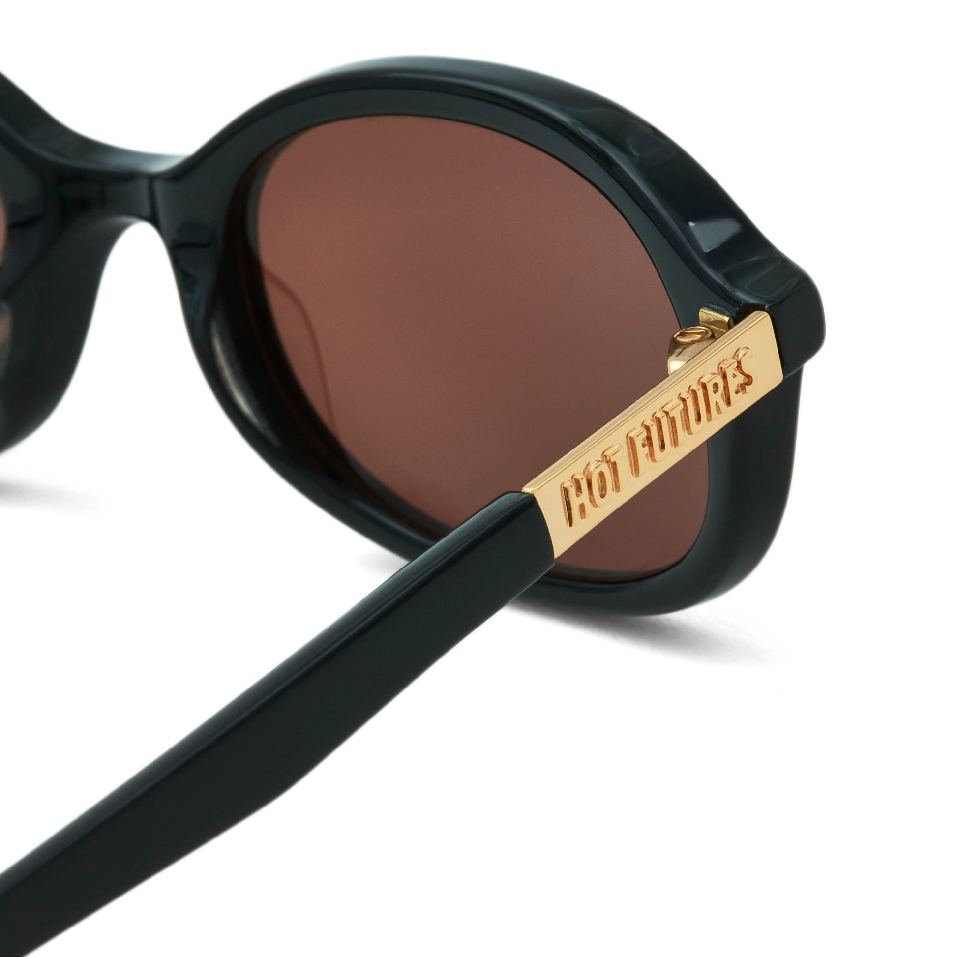 Black sunglasses with gold logo on a white background