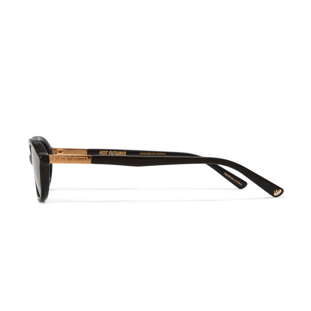 side shot of the cupid gloss black sunglasses showing the gold text Hot Futures branding and the iconic gold flame logo at the end of the left arm