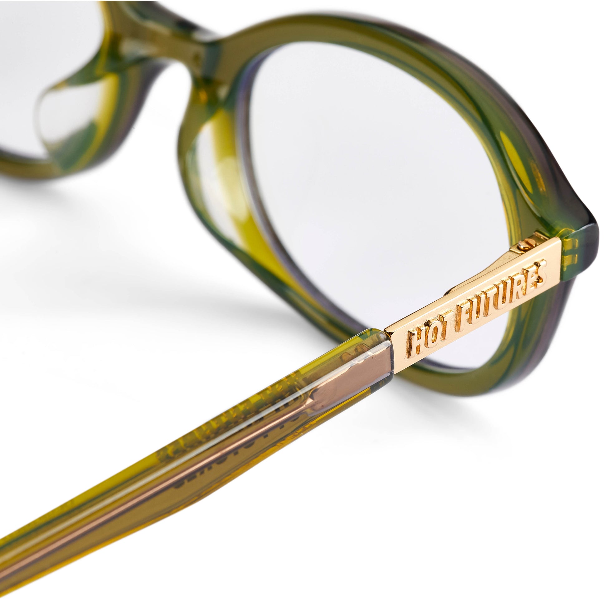close up image of the olive green cupid eye glasses with the gold Hot Futures branding