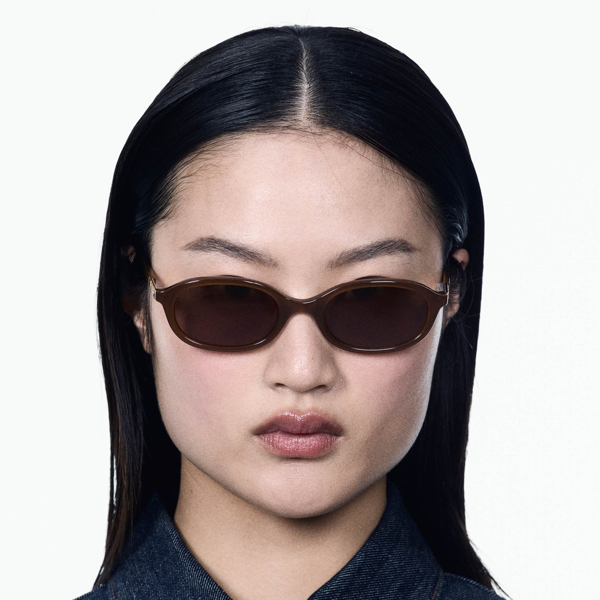 model wearing the caramel cupid sunglasses 