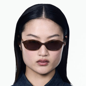 model wearing the caramel cupid sunglasses 