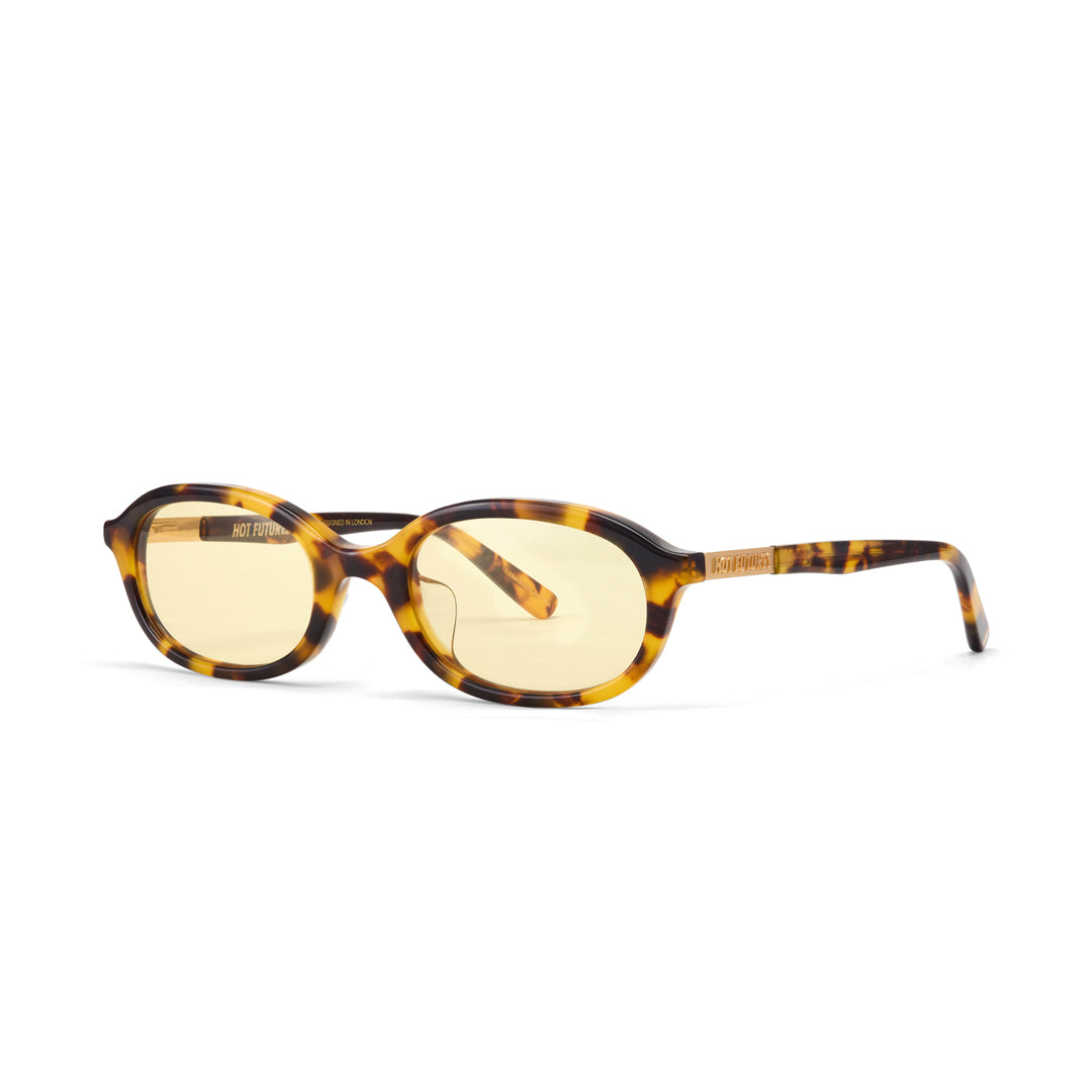 Sunglasses with tortoiseshell frame and yellow lenses on a white background