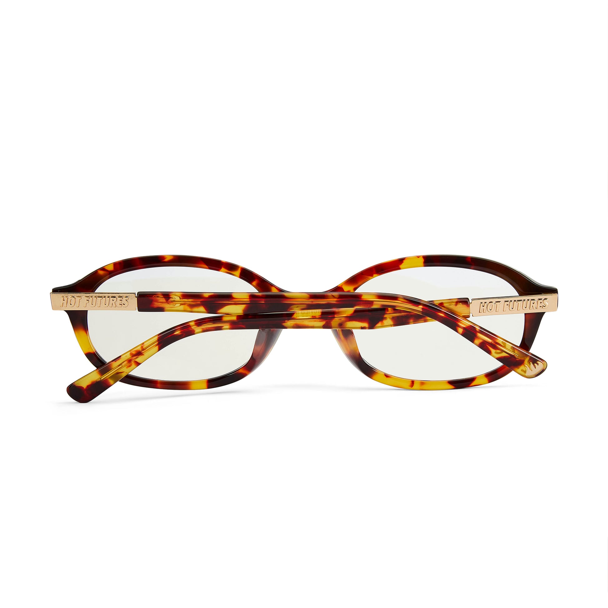 Tortoiseshell eyeglasses with gold accents on a white background