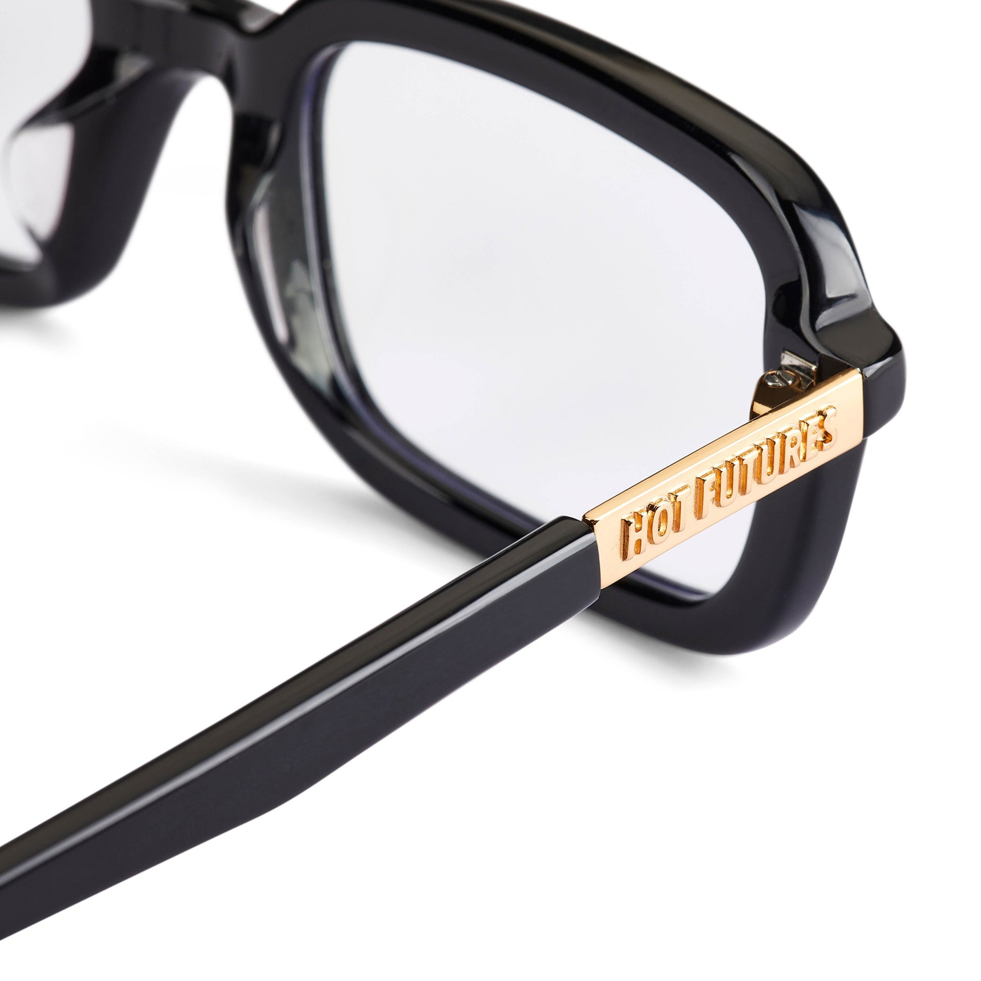 Close up shot of the Dazed optical glasses in gloss black with clear lenses