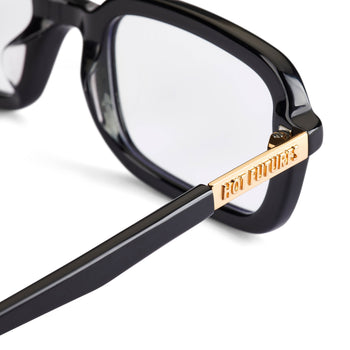 Close up shot of the Dazed optical glasses in gloss black with clear lenses