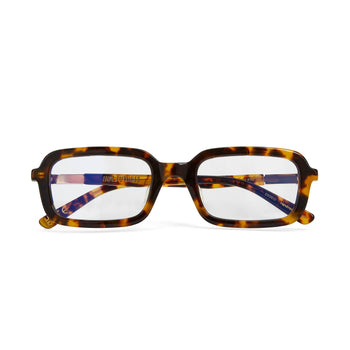 A pair of eyeglasses with a tortoiseshell pattern frame and clear lenses, featuring a Y2K inspired design with a slim rectangle frame.