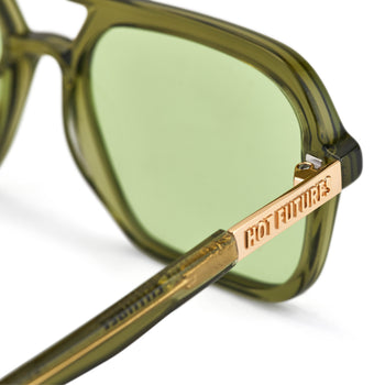 A pair of green tinted aviator sunglasses with an olive green frame. With gold Hot Futures text branding on sides of glasses arms