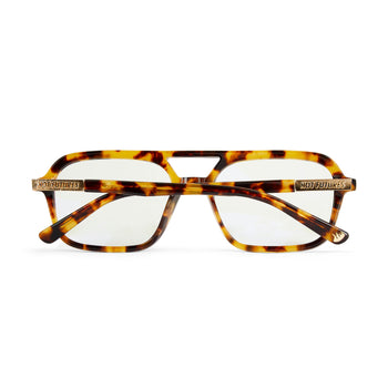Tortoiseshell eyeglasses with gold accents on a white background