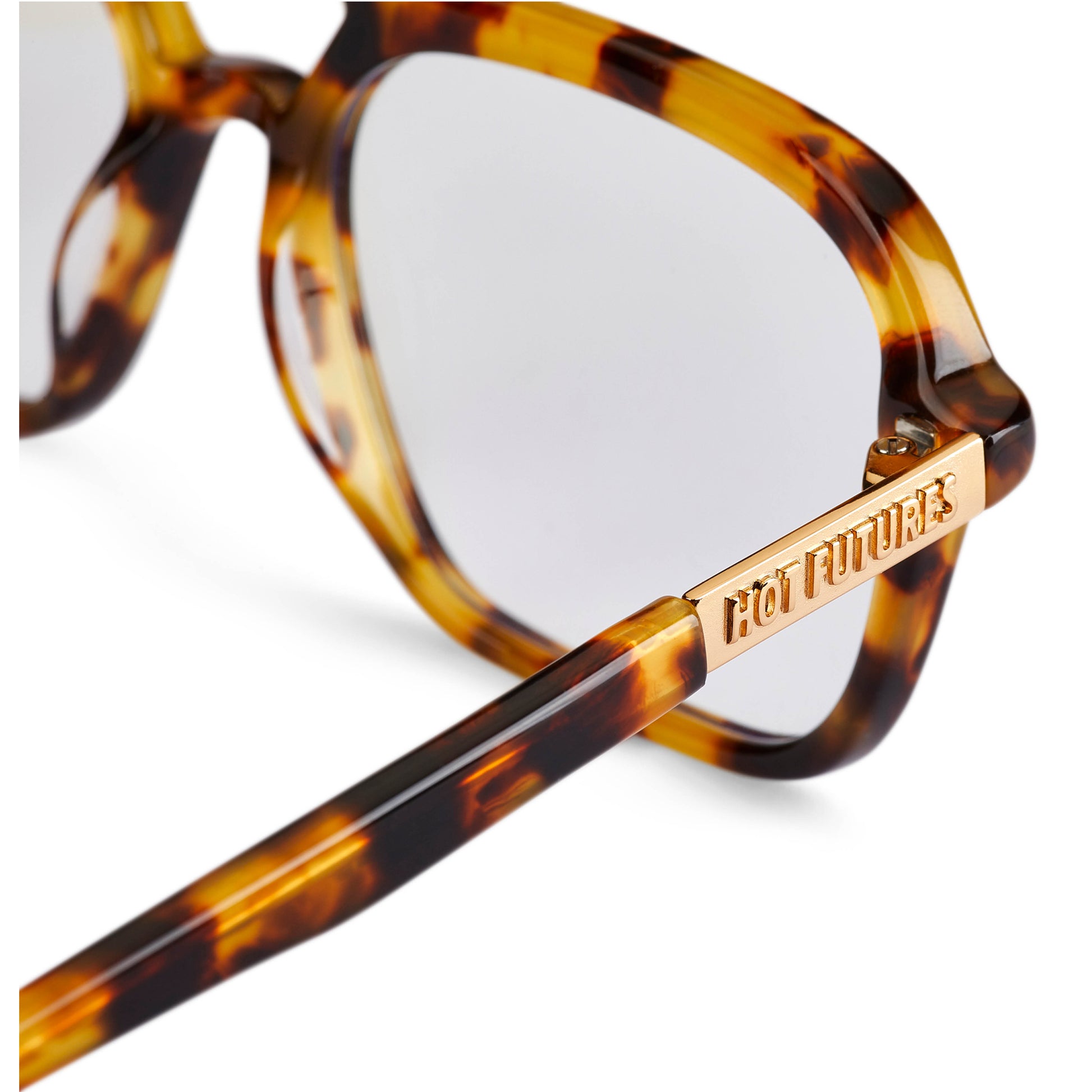 Tortoiseshell eyeglasses with a gold frame and 'Hot Futures' branding on a white background.