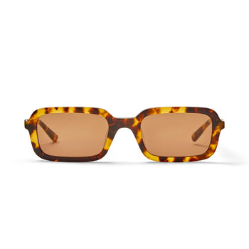 Dazed tortoiseshell sunglasses with a tan lens shot from the front against a white background