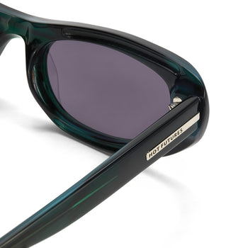 Black sunglasses with a visible brand logo on a white background