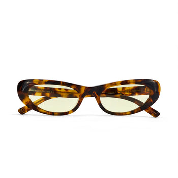 Tortoiseshell cat-eye sunglasses on a white background