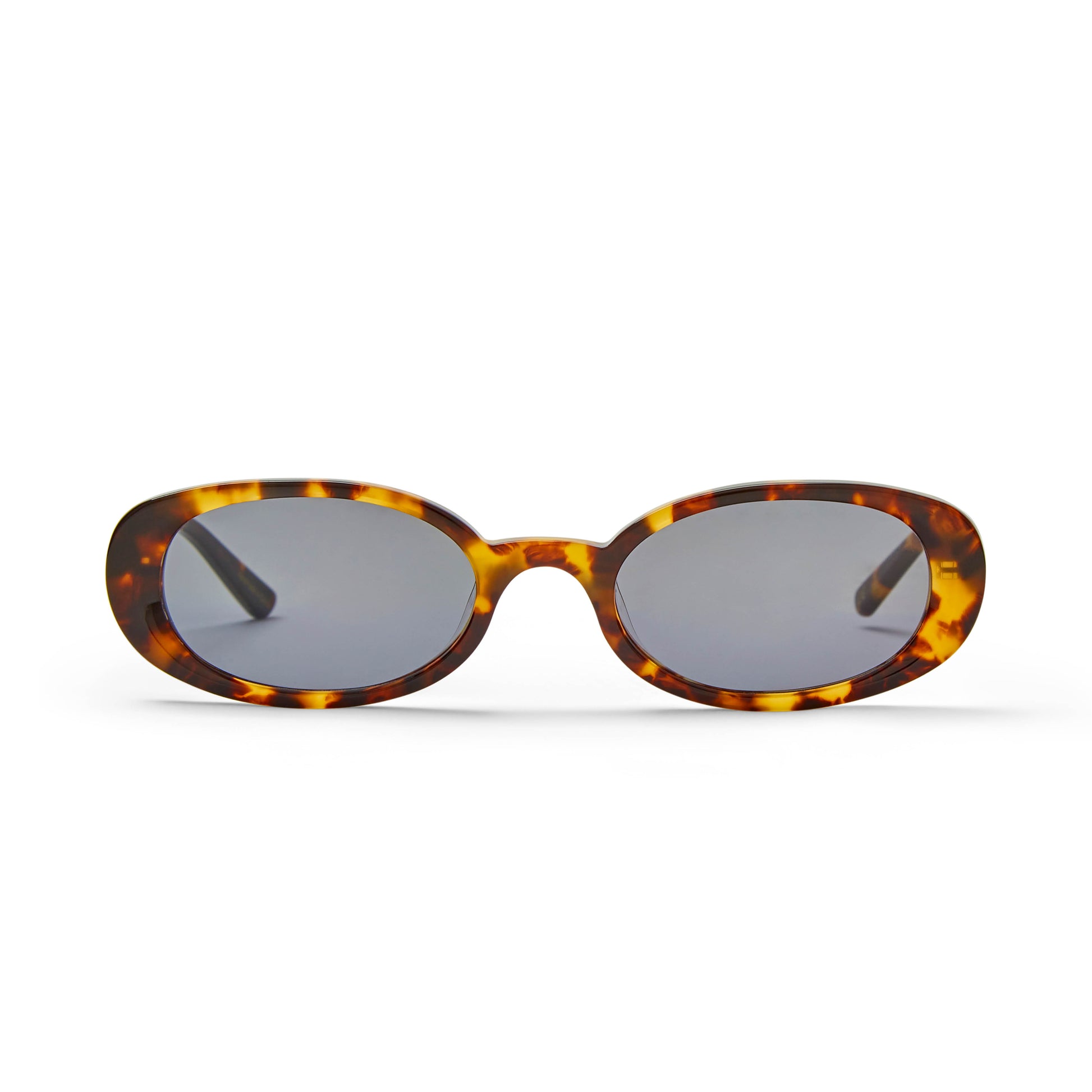 A pair of oval-shaped sunglasses with a tortoiseshell pattern frame and smoke-coloured lenses.