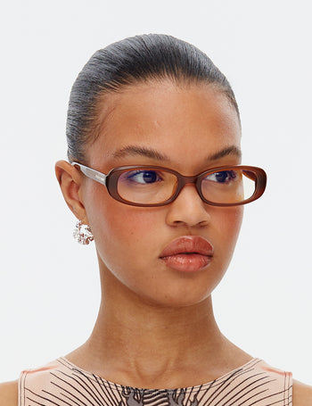 Model wears Hot Futures Aurora brown Frame Clear Lens Optics Glasses