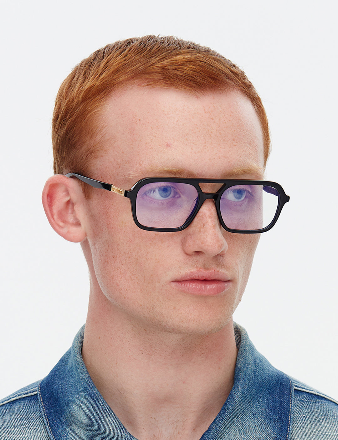 Man wearing glasses with a white background