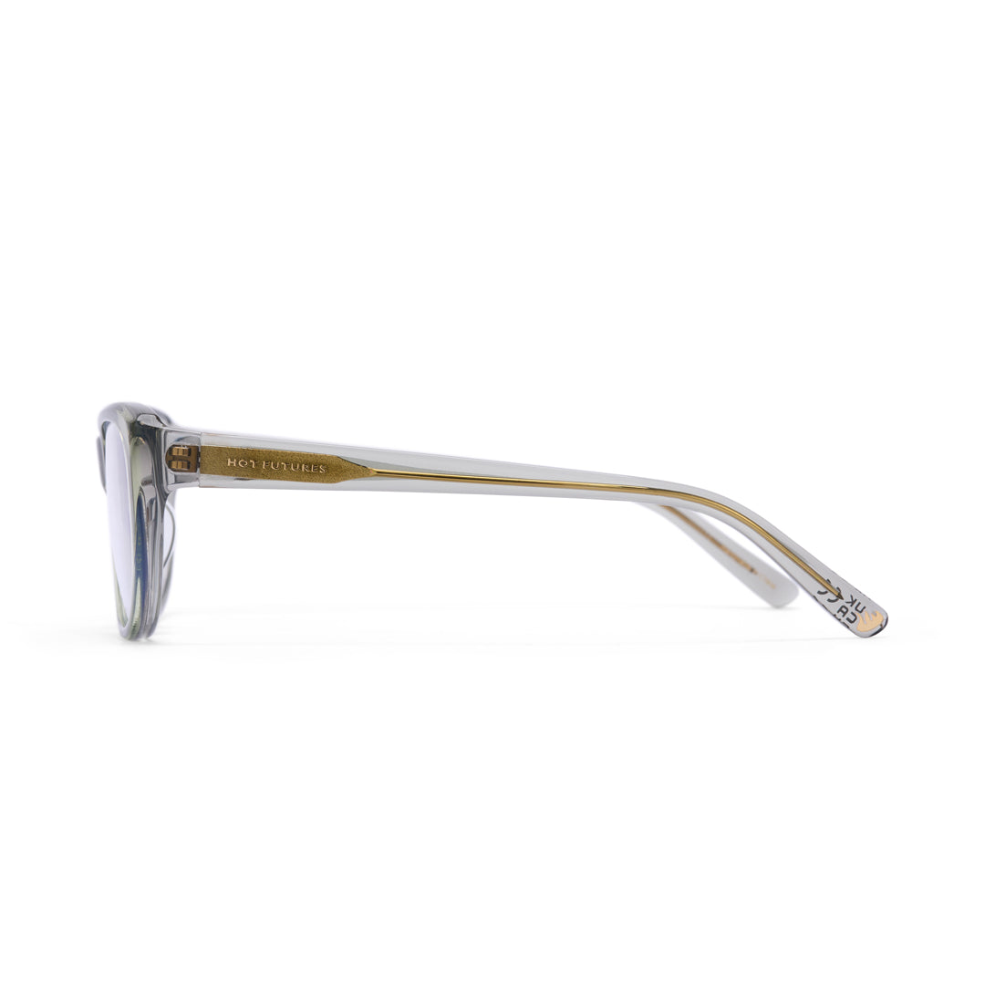 Sunglasses with gold frame and clear lenses on a white background